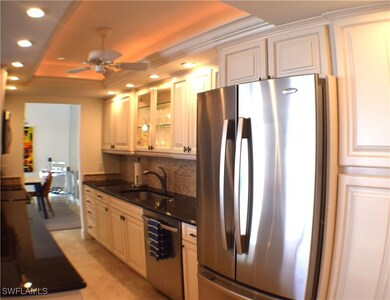 Kitchen with stainless steel appliances, a sink, a