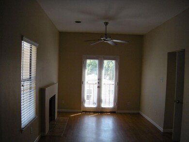 Unfurnished living room featuring a fireplace wit