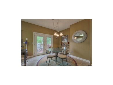 New French Doors Overlooking Amazing Two Tiered De