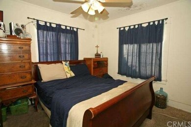 Master bedroom backs to back yard.  Good size now,