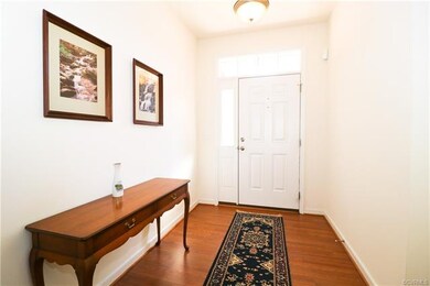 Foyer with hardwood flooring