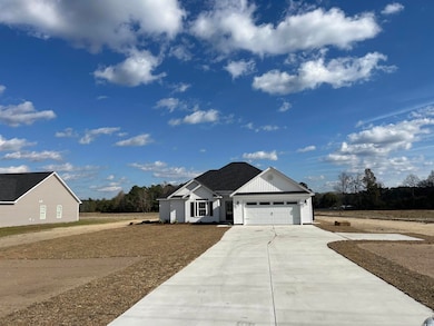 View of front of home with a garage