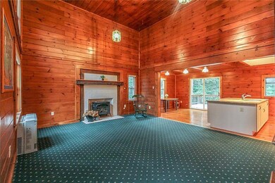 Living room with cathedral ceilings...