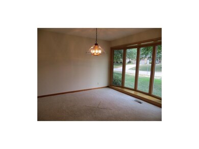 Formal Dining room offers wide windowed bay.