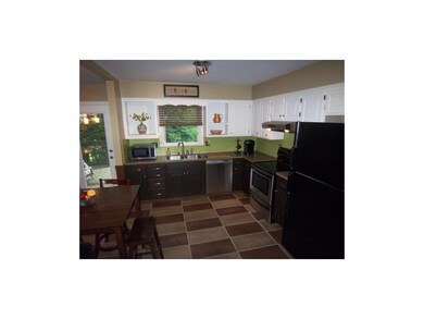 Fresh, Updated kitchen with tile floors, open conc