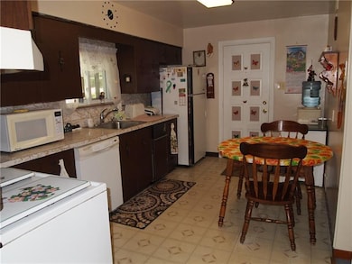 Another view of the eat in kitchen allows you to s