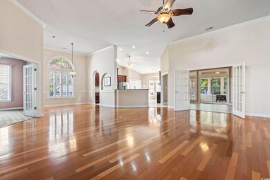 Unfurnished living room featuring french doors, ce