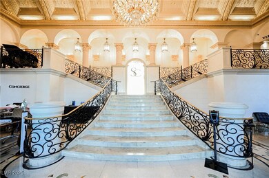 Stairway with coffered ceiling, ornamental molding, a high ceiling, and beamed ceiling