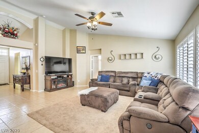 Living room showing vaulted ceilings & gorgeous ce