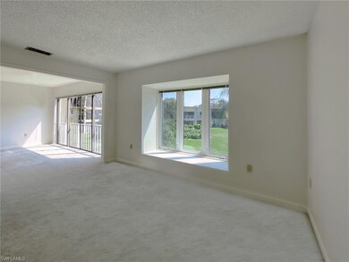 GREAT ROOM INTO DINING ROOM WITH LAKE VIEWS