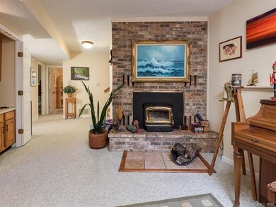 Family room with wood burning fireplace