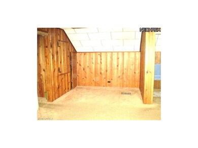 A partial view of the upstairs, which has 1 - 2 bedrooms, one with built in drawers, and a spacious half bath.