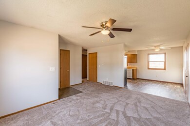 LIVING ROOM TO DINING AREA