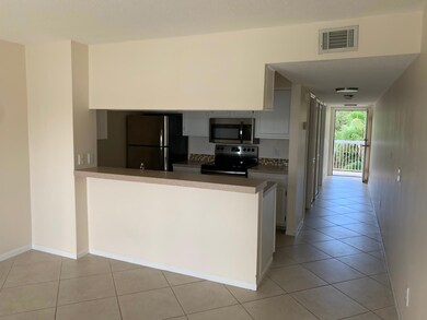 293 Cypress Point Dr unit 293, Palm Beach Gardens, FL 33418 - photo 2