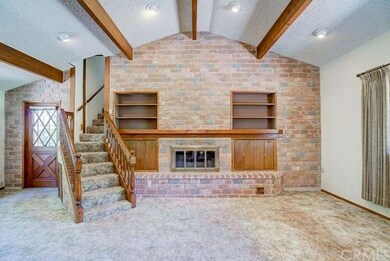 Brick feature wall with fireplace and custom built