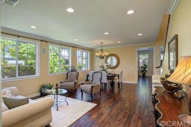 Open Living Rm and Dining Space with Wood Flooring