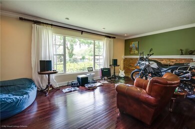 Living room with large window with views of Lake L