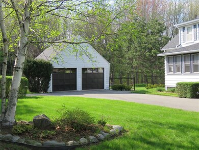 Landscaped, with shade trees.