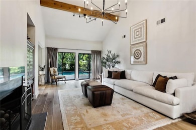 Another view of the living room with fine appointm