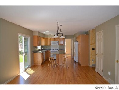 Kitchen 2 sliders to the backyard and patio
