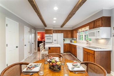Unbelievable - 3 pantries on the left of in Kitchen - one designed for linens!!!  Many more Custom features