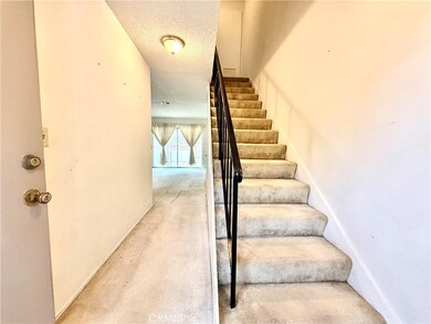 Stairs leading to 2 Spacious Bedrooms