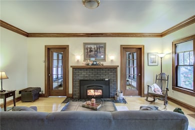 Living Room w/Wood Burning Fireplace