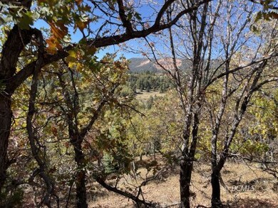 Pink cliffs through the trees