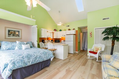 Bedroom with light hardwood / wood-style floors, a