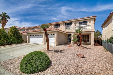View of front of home featuring a balcony, a 3 car