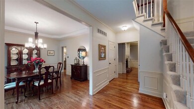 Welcoming entryway featuring beautiful hardwood fl