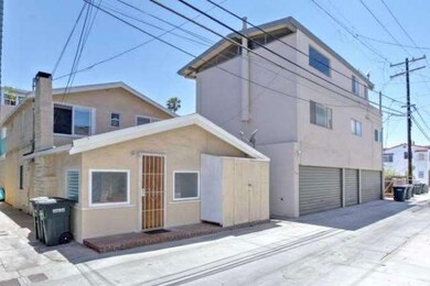 Two story back unit with entrance off alley. 