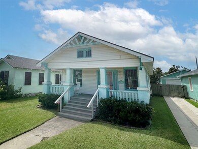 Wide staircase and lovely front porch.