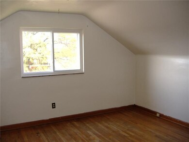 Larger of the two upstairs bedrooms is about 12' X