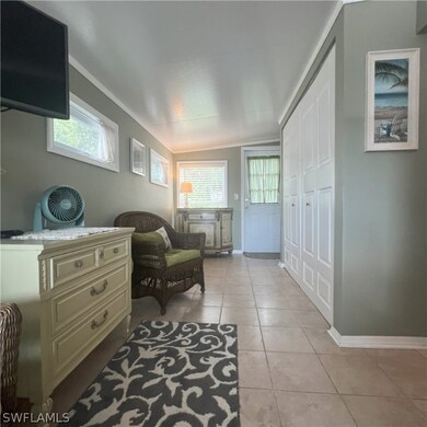 Florida Room with sitting area and TV