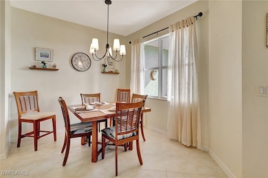 Dining space featuring an inviting chandelier and
