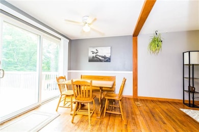 Gather family or friends in this dining room with 