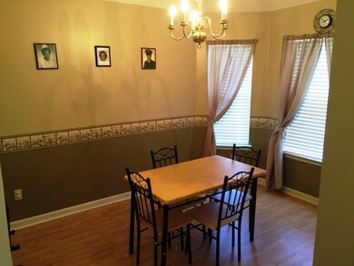 separate dining room with hard wood floors and big