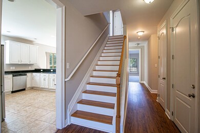 Front entry stairwell/ kitchen