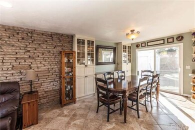 Sliding glass doors open to very large patio and b