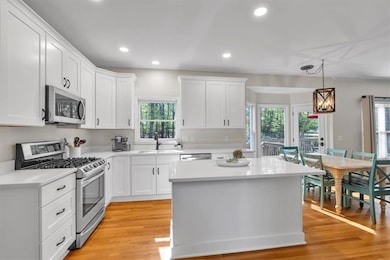 Introductory Photo 2-All new crisp white kitchen c