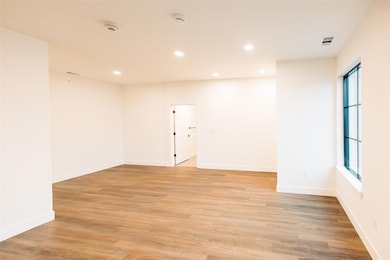Unfurnished room with a wealth of natural light, 