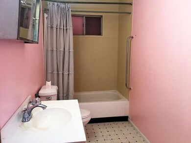 Bath has new floor & toilet