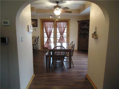 Dining Room. The gracious curve of the archway bet
