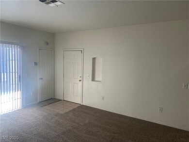 Carpeted spare room with plenty of natural light a
