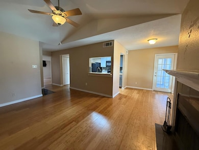 Unfurnished living room with lofted ceiling, ceili