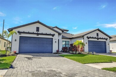 View of front of property with a garage