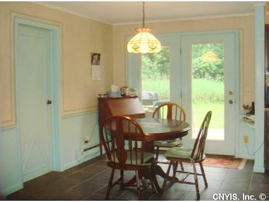 Kitchen. Deck off kitchen to back yard.  Plus laun
