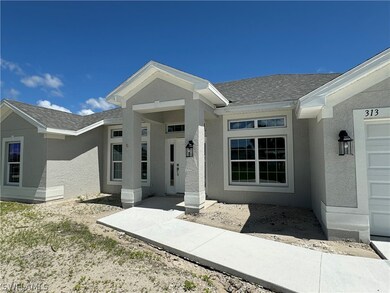 313 NE 26th St, Cape Coral, FL 33909 - photo 4