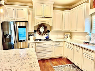 This beautiful kitchen is a chef's dream with lots